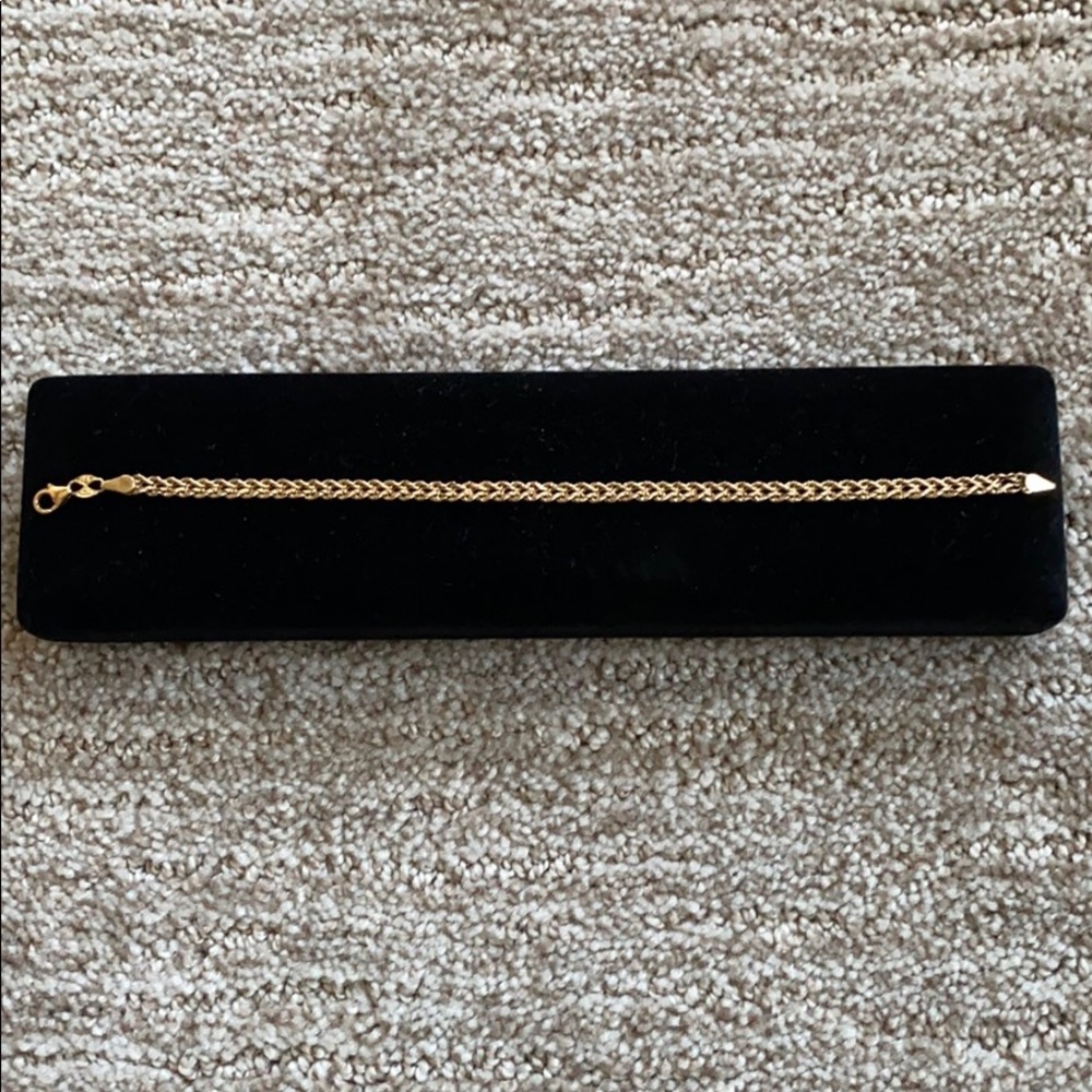 Gold bracelet worn